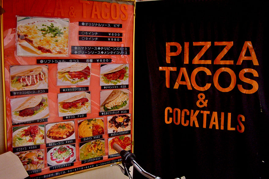 Photo of restaurant menu offering strange Japanese versions of tacos and pizza